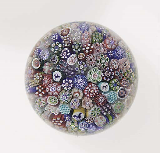 A Baccarat miniature dated close millefiori weight