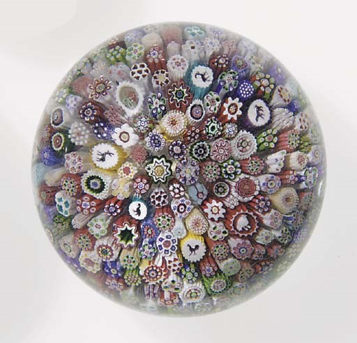 A Baccarat signed and dated close millefiori weight