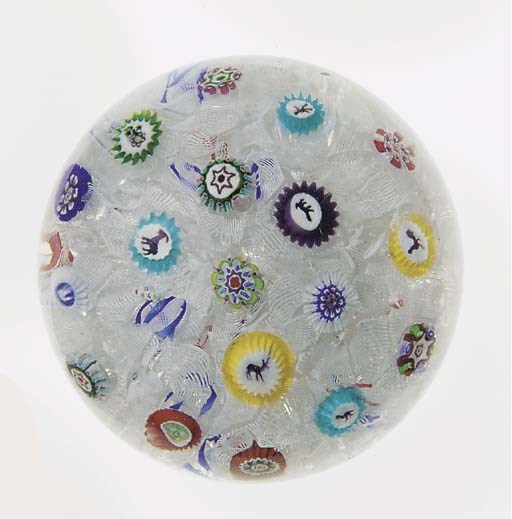 A Baccarat signed and dated scattered millefiori weight