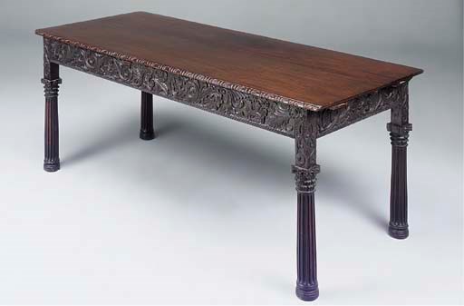 A CARVED MAHOGANY SERVING TABLE