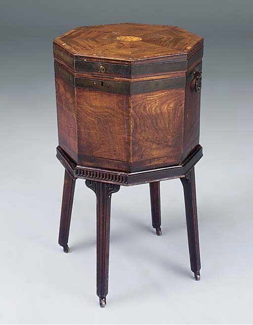 A GEORGE III MAHOGANY AND INLAID OCTAGONAL CELLARETTE ON STAND