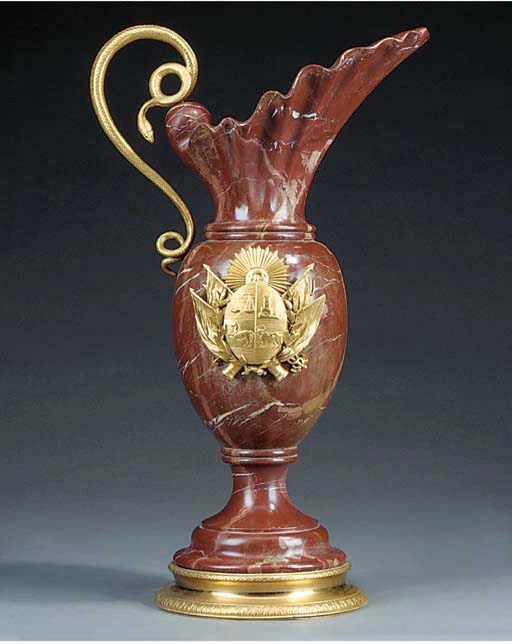 An Italian gilt bronze mounted variegated red marble ewer