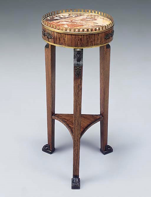 A ROSEWOOD, POSSIBLY CALAMANDER, VENEERED MARBLE TOP CIRCULAR GUERIDON