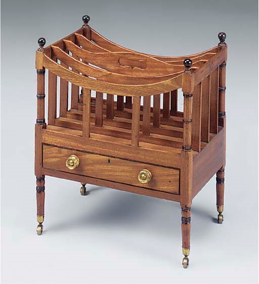 A REGENCY MAHOGANY AND EBONISED FOUR DIVISION CANTERBURY