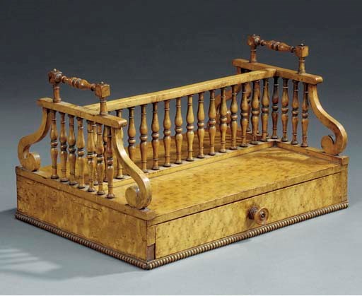 A Regency burr maple book stand