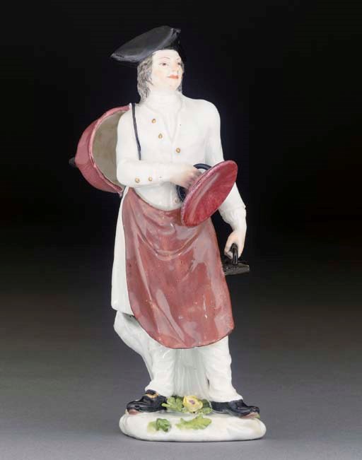 A Meissen figure of a laundryman from a series of Parisian Street Traders