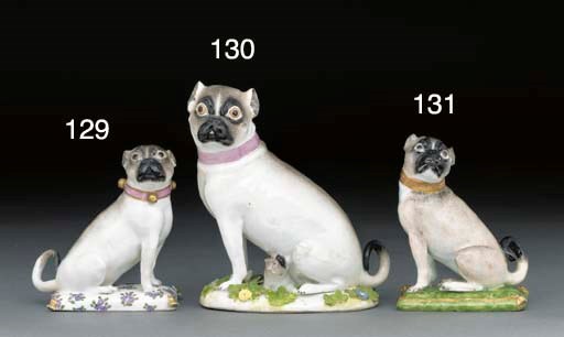 A Meissen group of a pug-dog and a puppy