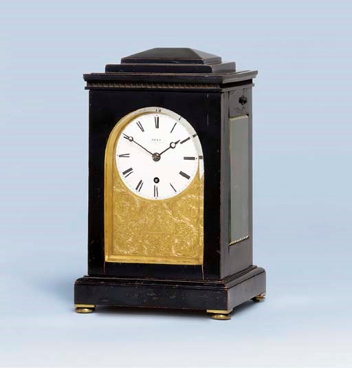 A Victorian ebonised library timepiece