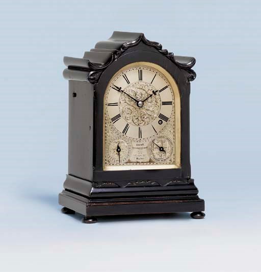 A Victorian ebonised month-going table timepiece with calendar