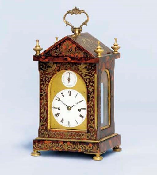 A George IV red boulle tortoiseshell and ormolu-mounted striking small mantel clock