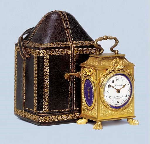 A French gilt-brass and enamel-mounted miniature carriage timepiece in the form of a pendule d'officier