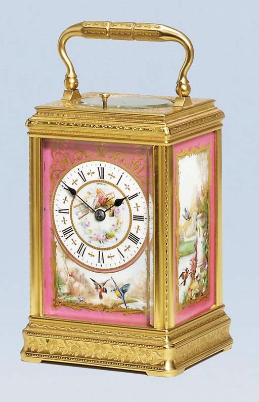 A French engraved gilt-brass and porcelain-mounted striking and repeating carriage clock