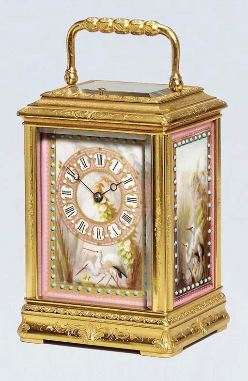 A French engraved gilt-brass and porcelain-mounted striking and repeating carriage clock