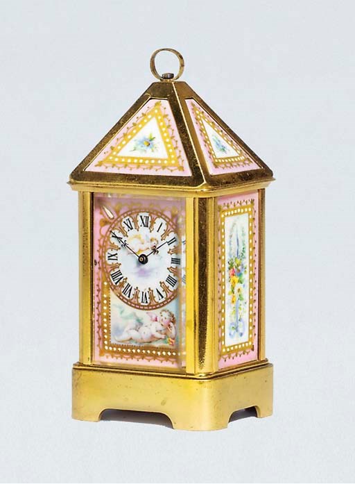 A French gilt-brass and porcelain-mounted miniature carriage timepiece
