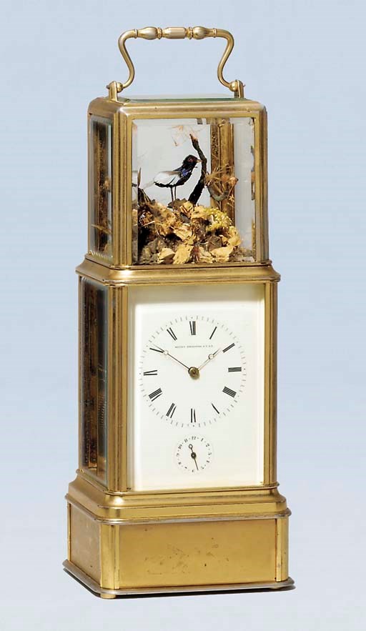 A French brass striking and repeating carriage clock with automaton singing bird
