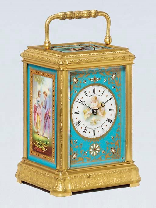 A French engraved gilt-brass and porcelain-mounted striking and repeating carriage clock