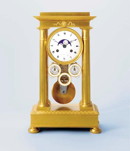 A Restauration ormolu astronomical month-going portico clock