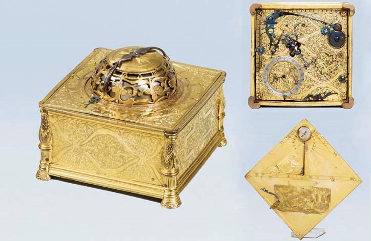 A German gilt-metal striking square table clock with alarm