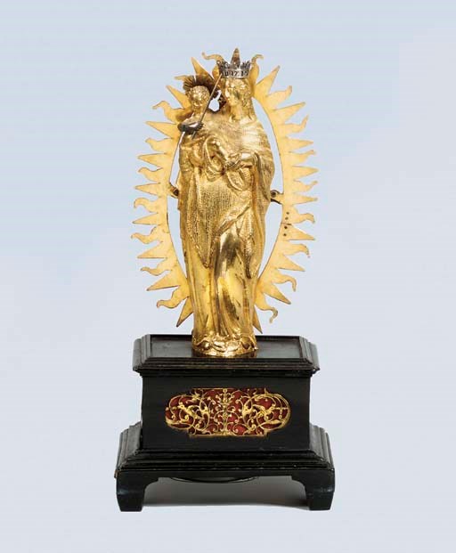 A German gilt-metal and ebony striking figural table clock