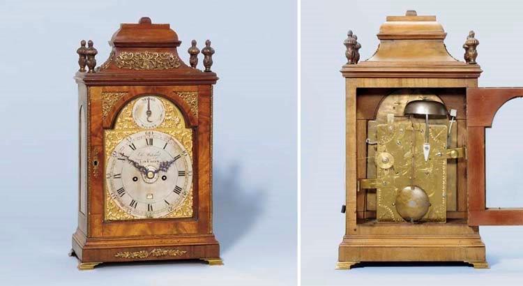 A George III mahogany and brass-mounted striking table clock with alarm