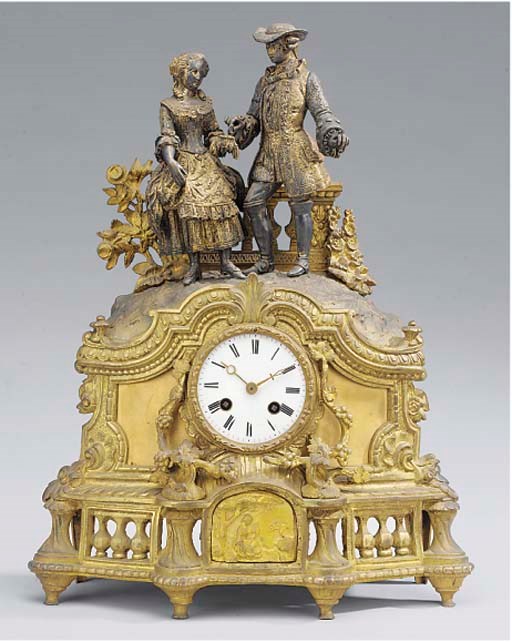 A Napoleon III gilt and patinated bronze figural striking mantel clock, circa 1860