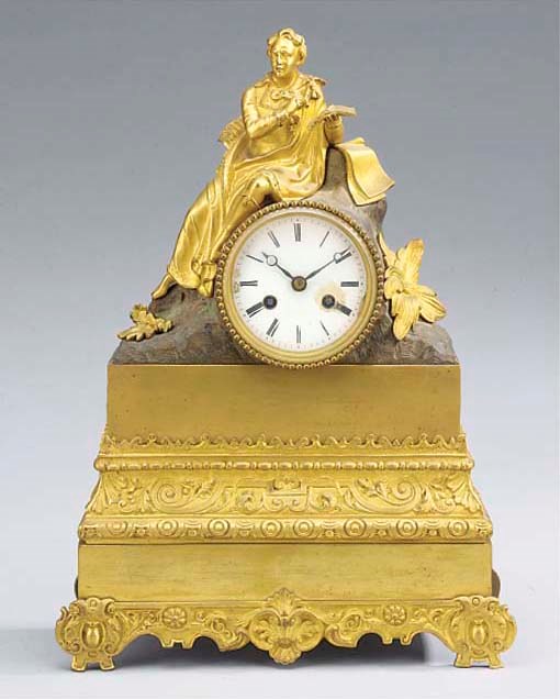A Louis Philippe ormolu and bronze figural striking mantel clock, circa 1840