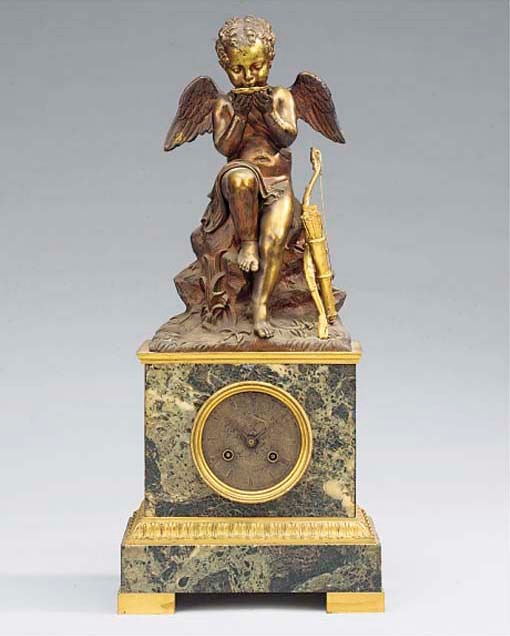 A Charles X bronze, ormolu and marmo verde antico figural striking mantel clock, circa 1830