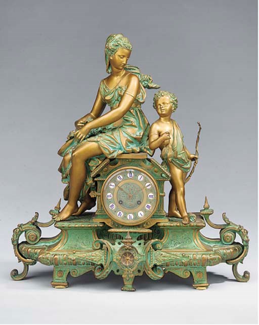 A French gilt and green painted figural striking mantel clock, circa 1880