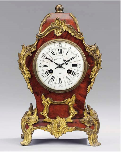 A French gilt-metal mounted mock red tortoiseshell striking mantel clock, circa 1890