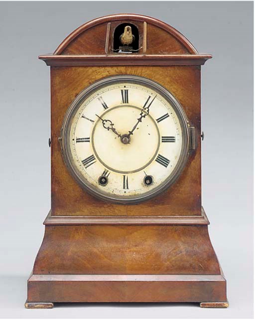 A Black Forest mahogany striking cuckoo table clock, second half 19th century