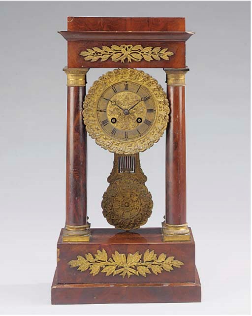 A Charles X ormolu-mounted mahogany striking portico mantel clock, circa 1830