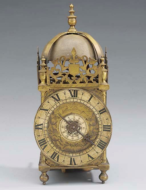 An English brass lantern clock with alarm, mid 16th century
