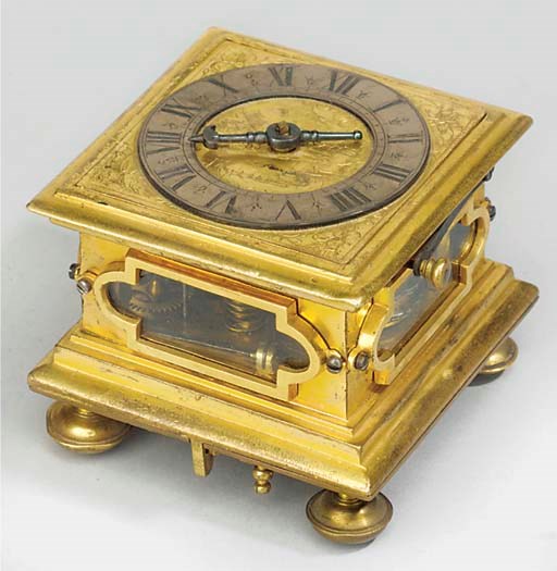 A Continental gilt-brass small striking table clock, third qarter 17th century