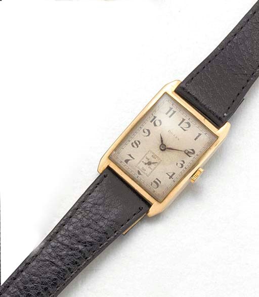 ROLEX: A 9ct. GOLD RECTANGULAR WRISTWATCH
signed Rolex, Ref: 34, 1926.