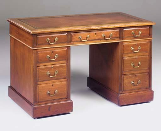 AN EDWARDIAN MAHOGANY PEDESTAL DESK