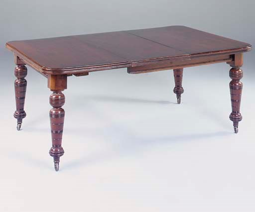 An early Victorian extending dining table, with two leaves