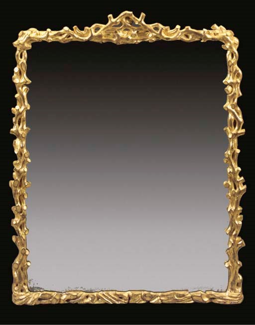 A VICTORIAN CARVED GILTWOOD OVERMANTEL MIRROR