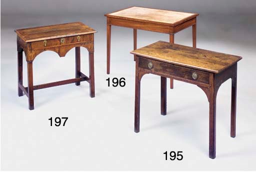A MAHOGANY WRITING TABLE