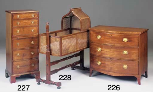 A MAHOGANY BOWFRONT CHEST OF DRAWERS