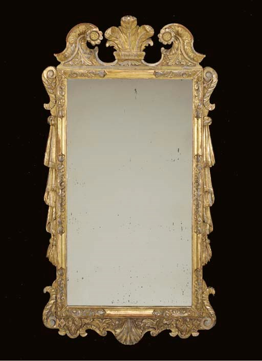 A GEORGE II STYLE GILTWOOD MIRROR,