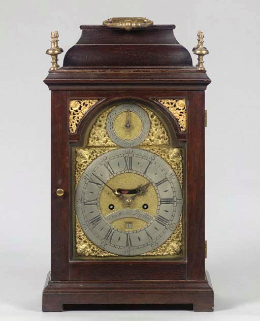 AN ENGLISH MAHOGANY MANTEL CLOCK,