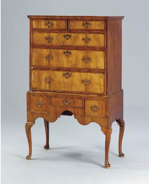 A GEORGE II PROVINCIAL WALNUT AND OAK CHEST-ON-STAND,