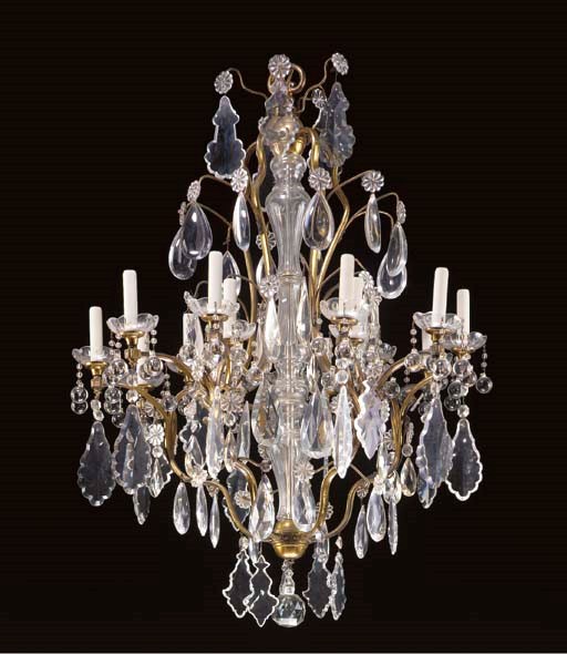 A LOUIX XV STYLE GILT-BRASS AND CUT-GLASS FIFTEEN-LIGHT CHANDELIER,