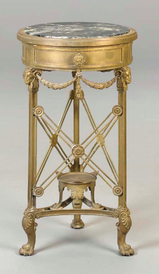 AN AMERICAN GILT-BRONZE GUERIDON,