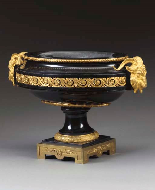 A LOUIS XVI STYLE ORMOLU-MOUNTED BLACK BELGIAN MARBLE URN-FORM CENTERPIECE