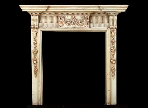 A GEORGE III STYLE GREEN-PAINTED CHIMNEY-PIECE,*