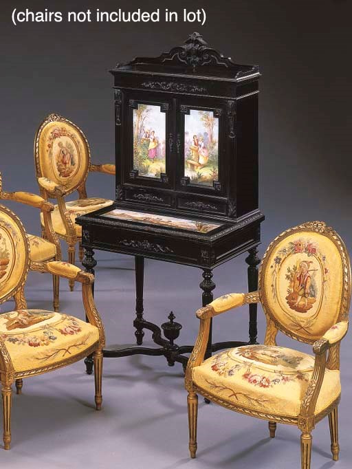 A NAPOLEON III PORCELAIN-MOUNTED EBONY AND EBONIZED BONHEUR-DU-JOUR