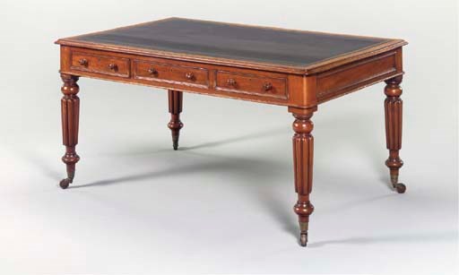AN EARLY VICTORIAN MAHOGANY WRITING-TABLE,