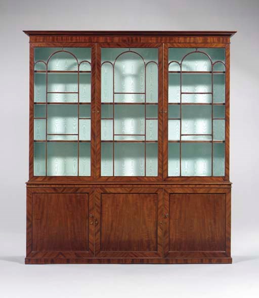 A GEORGE IV MAHOGANY BREAKFRONT-CABINET,
