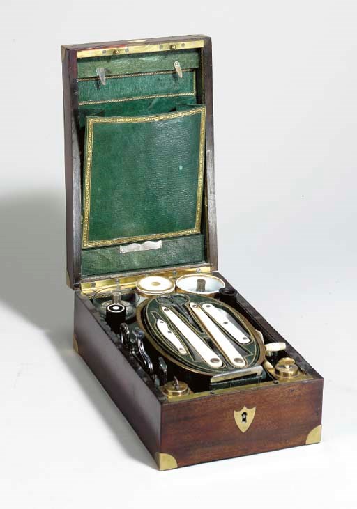 A RESTORATION BRASS MOUNTED NECESSAIRE WITH IMPLEMENTS **,